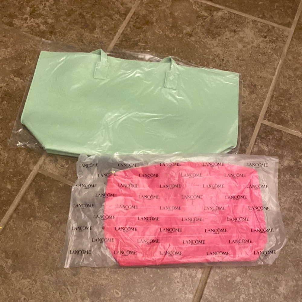 Lancome makeup bag and a tote bag.